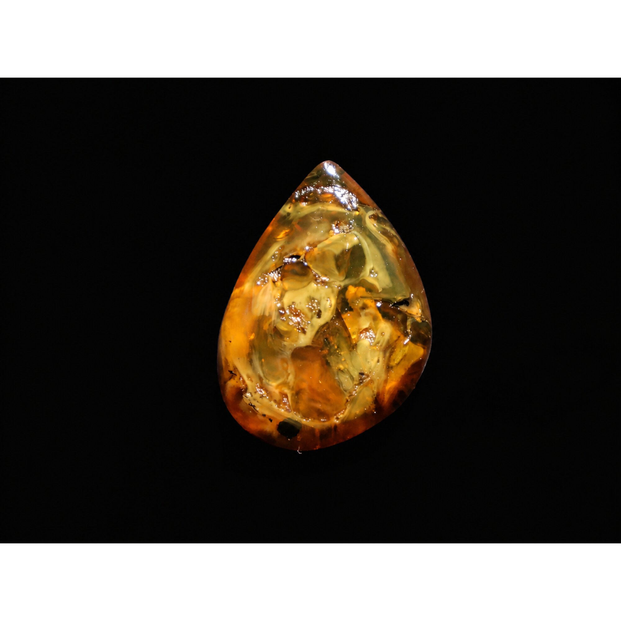 Translucent yellow orange Natural Dominican Amber teardrop Polished Stone 26 mm – photo 4