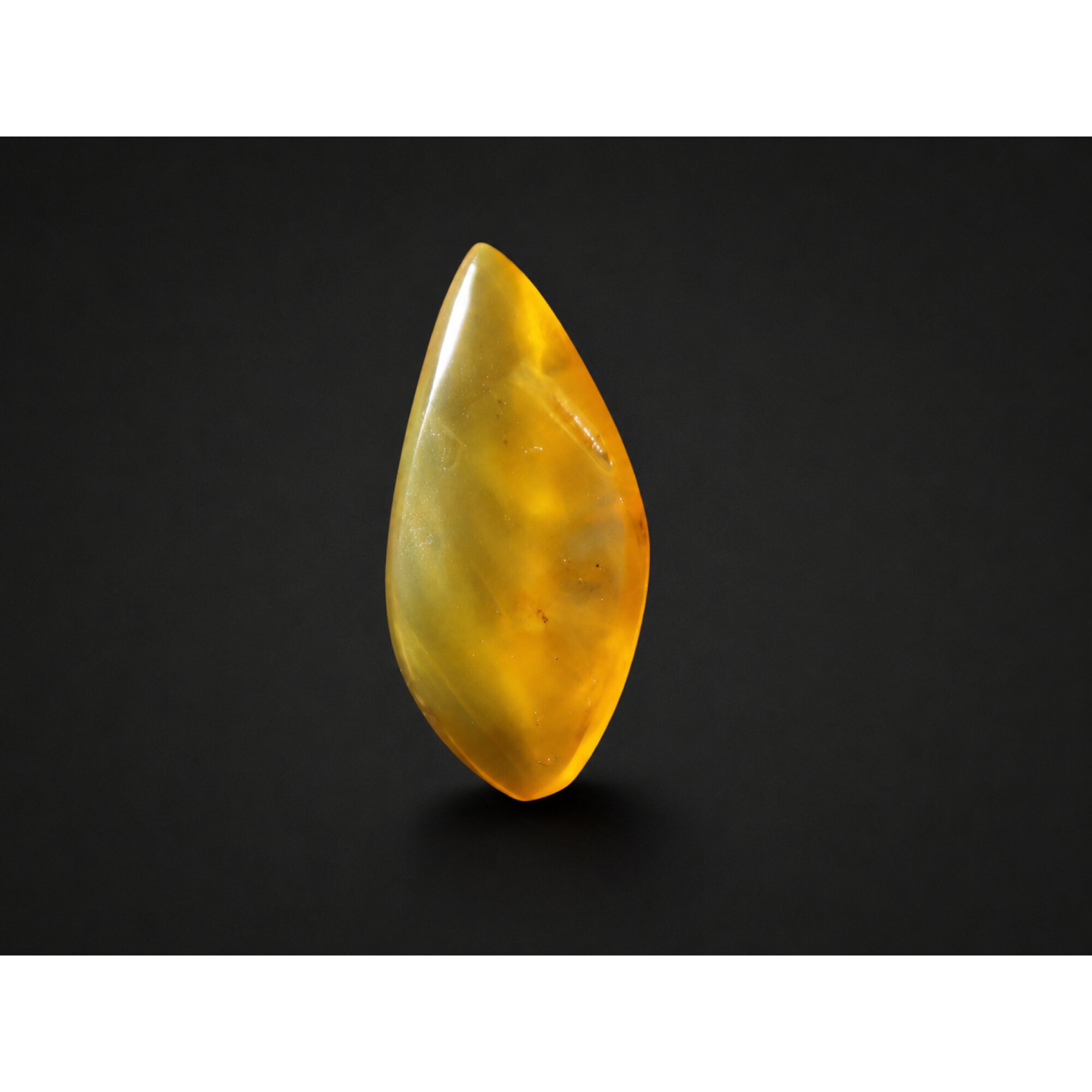 Translucent eggyolk yellow Natural Dominican Amber teardrop Polished Stone 26 mm – photo 7