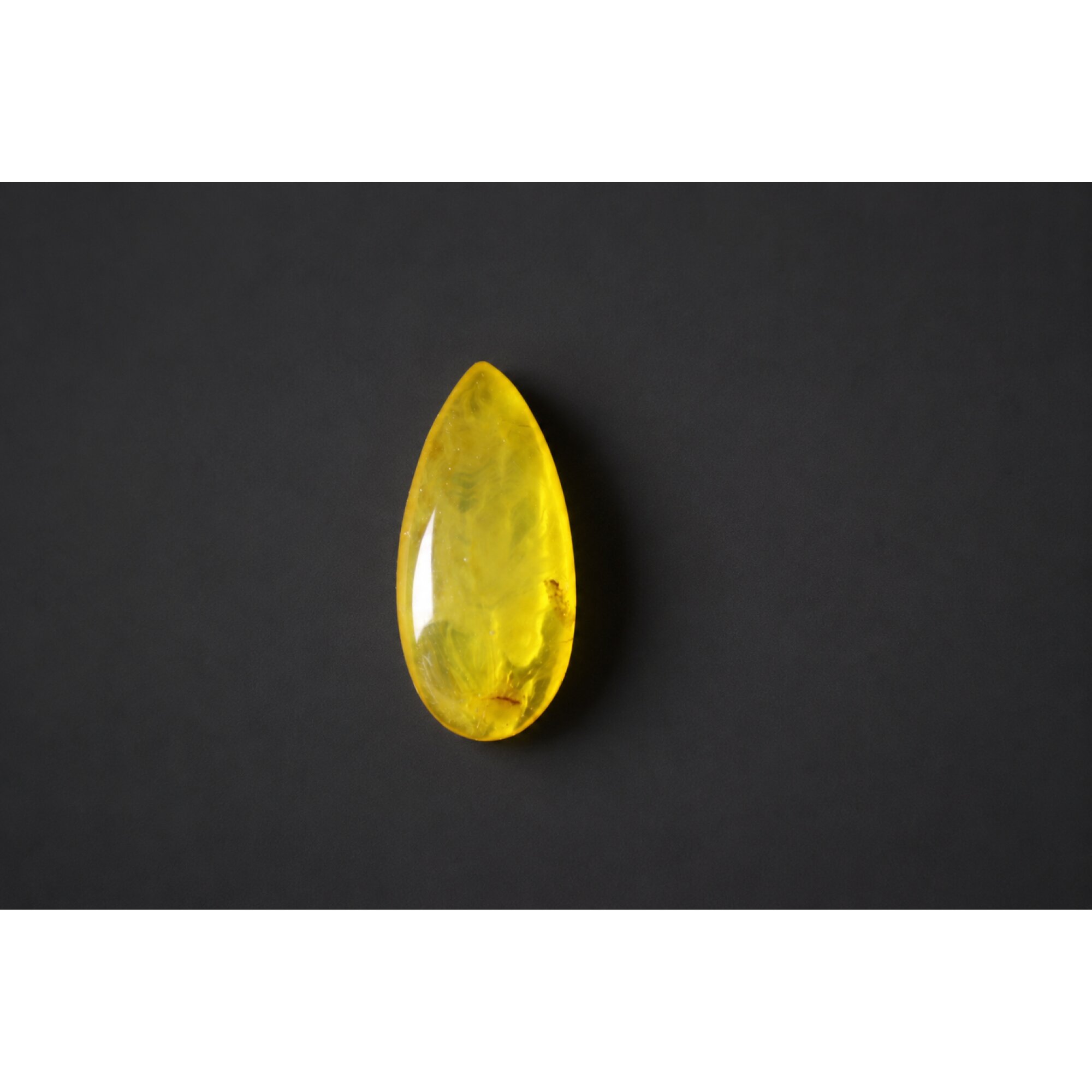 Clear eggyolk yellow Natural Dominican Amber teardrop Polished Stone 27 mm – photo 6