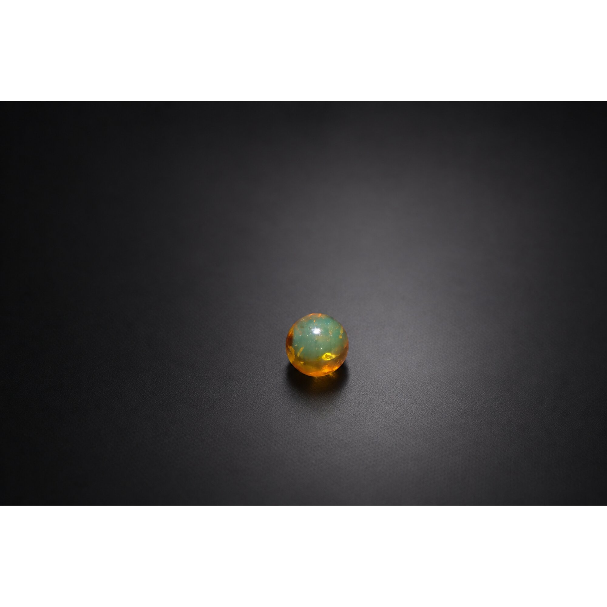 Natural light blue Dominican amber sphere/ball 10.5mm – photo 5