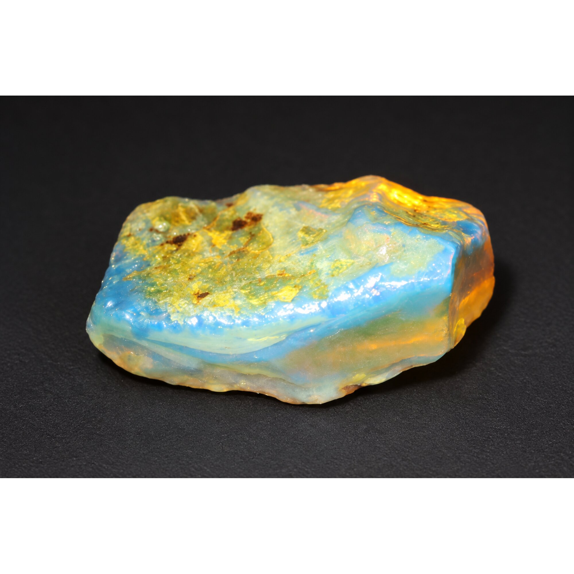 Naturally formed orange blue rough specimen Dominican amber 38mm – photo 6