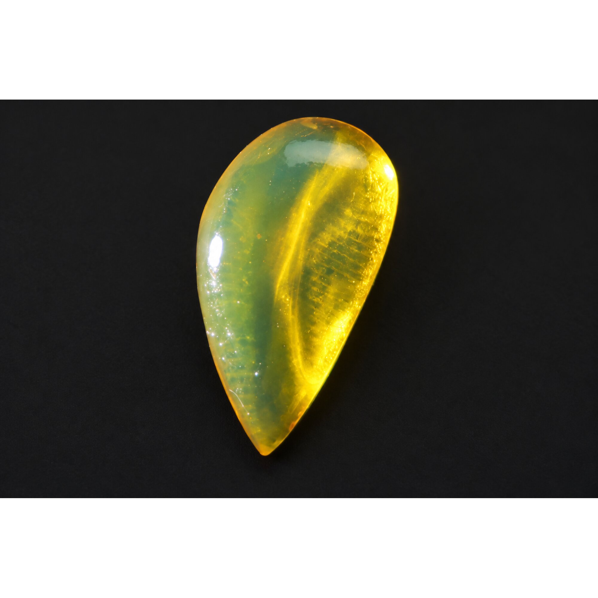 Authentic green yellow polished Dominican amber 0.8g – photo 2