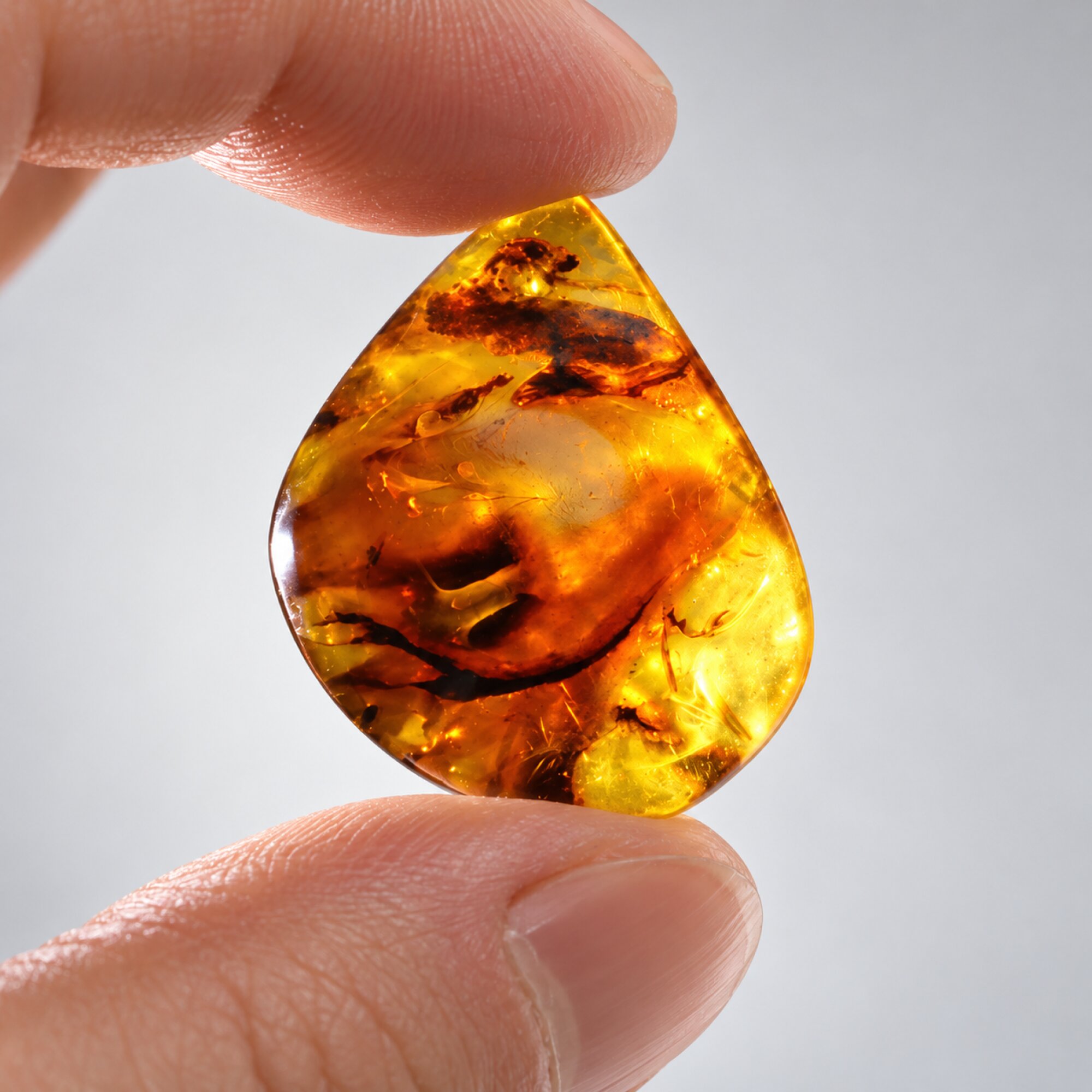 Untreated green red polished Dominican amber 2.3g – photo 2