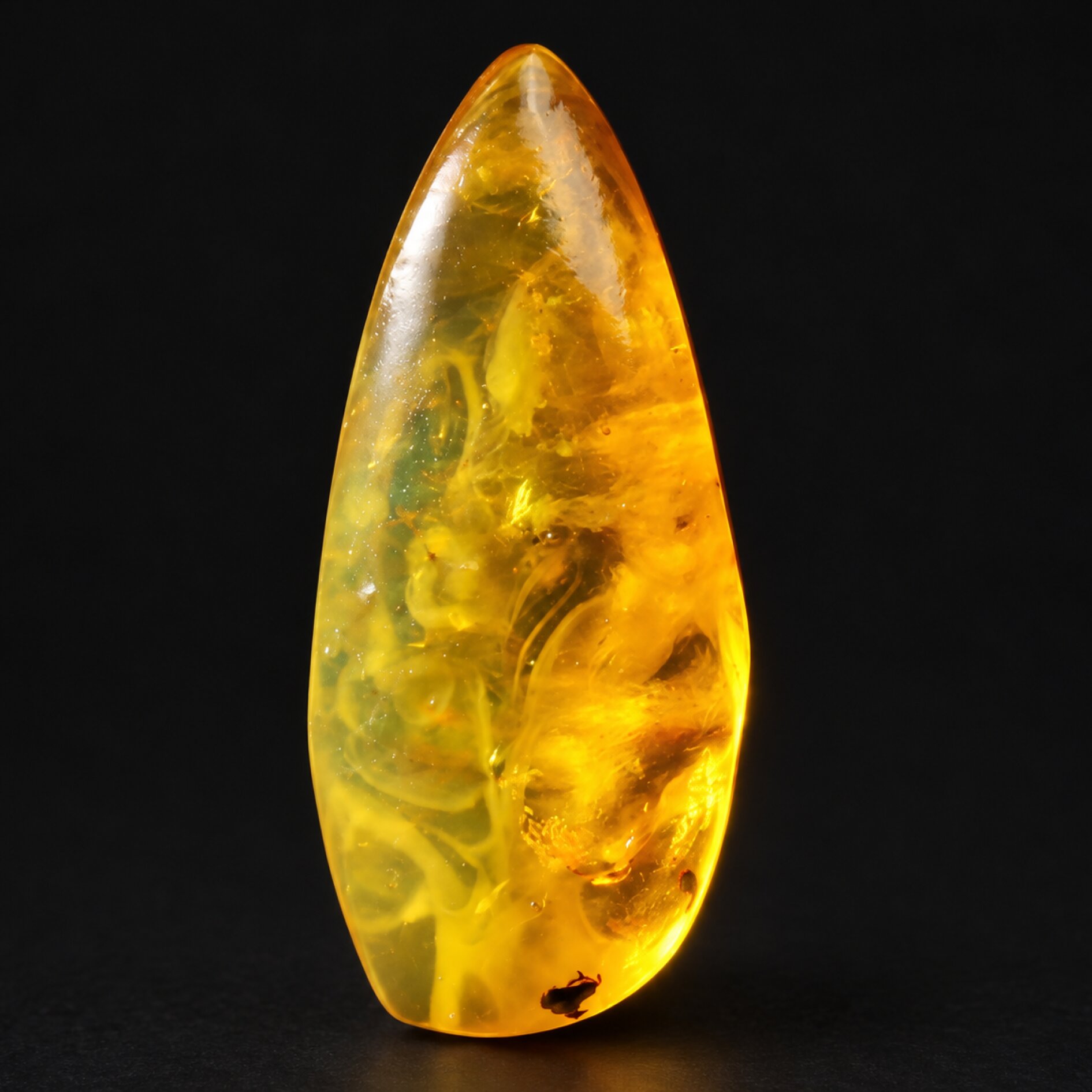 Natural yellow green polished Dominican amber
