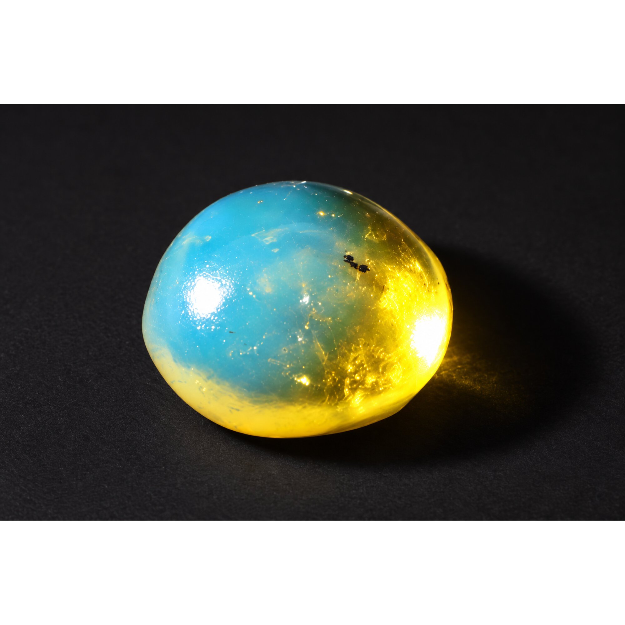 Nature created deep blue Dominican amber cabochon – photo 3
